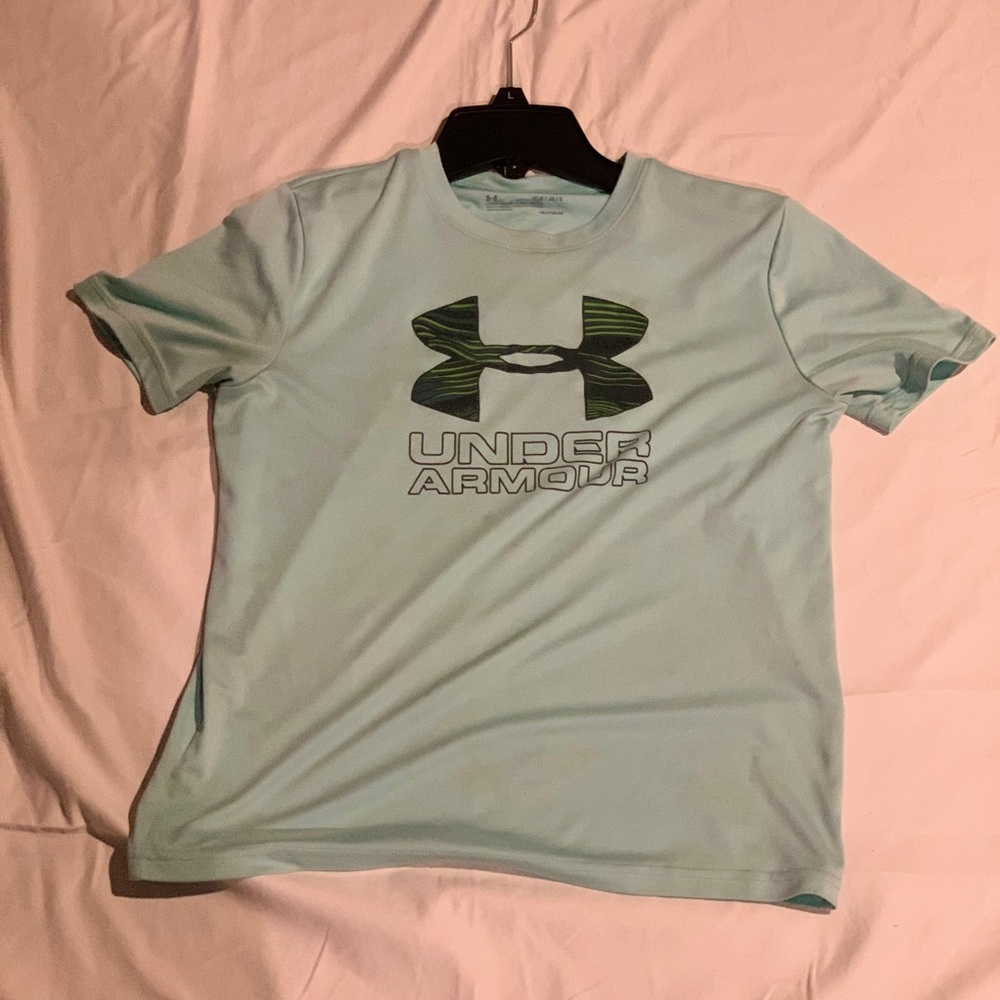 This is a cyan under Armour T-shirt